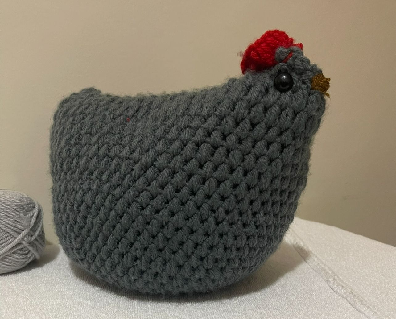 Grey crochet amigurumi hen